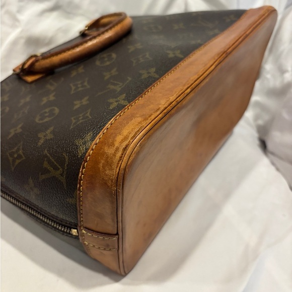 Louis Vuitton Alma Monogram Coated Canvas Handbag - Picture 8 of 16